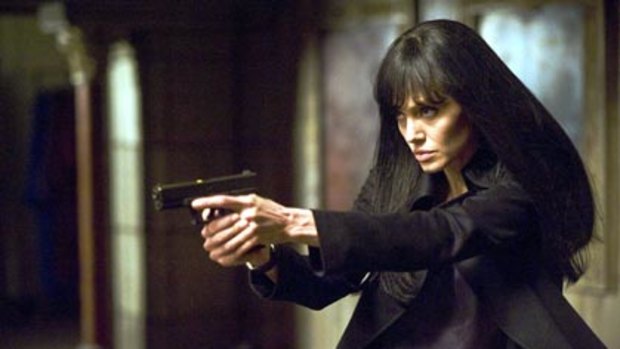 In the line of fire  ... Angelina Jolie, as Evelyn Salt, gets in and out of scrapes  so fast it will take your breath away.