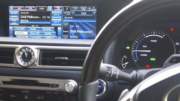 A Lexus GS450h console, with radio tuned to DAB+.