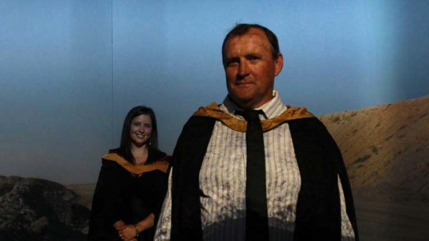 ''Keep chipping away and it soon starts to loosen up the grey matter''&#8230; Rick Newbury, who graduated yesterday with daughter Kara.