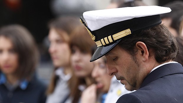 Costa Crociere liner company first officer Nicola Della Porta participates in a march in downtown Genoa, Italy, on Sunday.