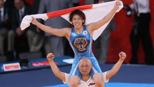 Saori Yoshida wins the gold medal.