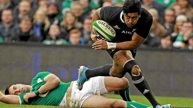 Julian Savea pounces on a kick by Aaron Cruden to score the opening try for the All Blacks.