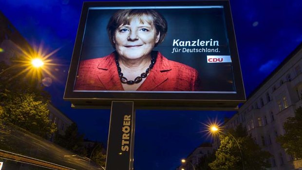 An election campaign poster for German Chancellor Angela Merkel.