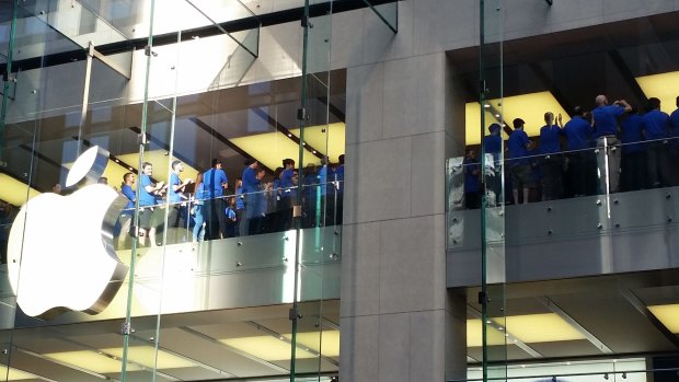The Apple team gathers for some pre-launch team-building at Sydney's George street store.