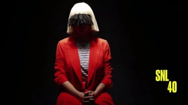 Sia Furler covers her face for her <i>Saturday Night Live</i> performance.