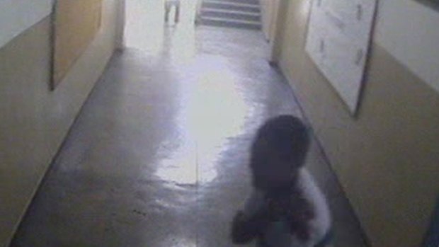 A student with a bullet wound can be seen fleeing.