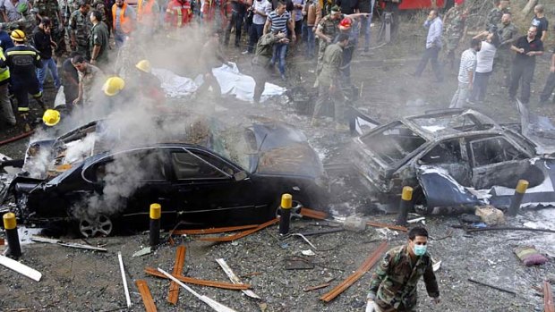 Beirut blast: Soldiers, policemen and medical personnel at the site of explosions near the Iranian embassy.