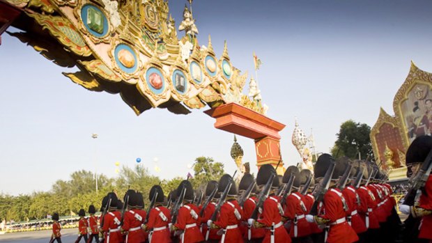 Units of Thailand's Royal Guard march to the Royal Plaza.