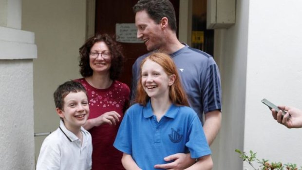 Michelle Levy arrives home with her parents, Adam and Anne Levy, and her brother.