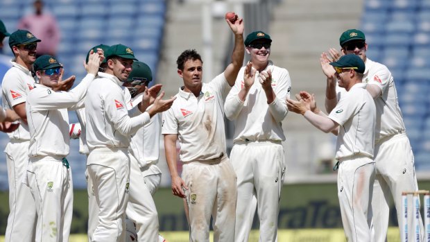 Dumped: Steve O'Keefe celebrates his fifth wicket in the second innings of the first Test match against India in Pune in February.