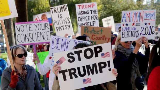 Protesters rally outside the Capitol in Phoenix, Arizona.