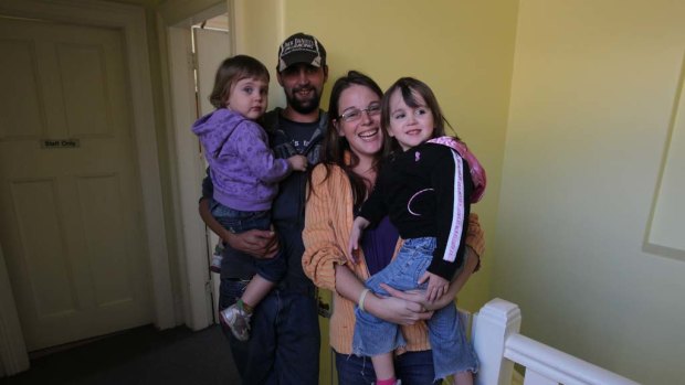 Let's stick together ... Shane Grover, Melissa Murphy and daughters Casandra, 2, and Laura, 3.