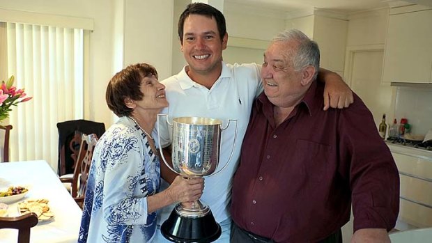 Welcome home ... Daniel Popovic with his parents.