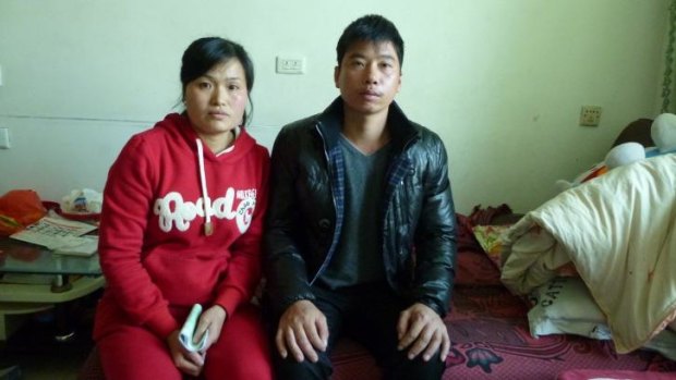Painful memories: Yu Rongfen, with husband Xu Liangkai, had her foetus forcibly aborted.