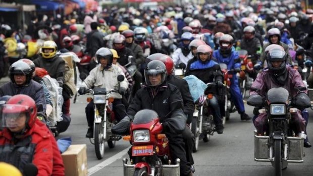 About 400,000 people will travel home by motorcycle for the annual Spring Festival break.