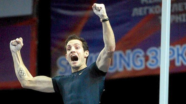 Record: France's Renaud Lavillenie reacts justs after breaking Sergei Bubka's 21-year-old indoor pole vault world record.