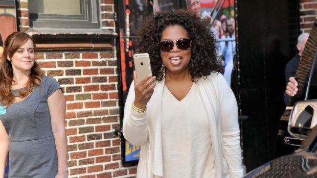 Oprah Winfrey visits Late Show With David Letterman on May 14.
