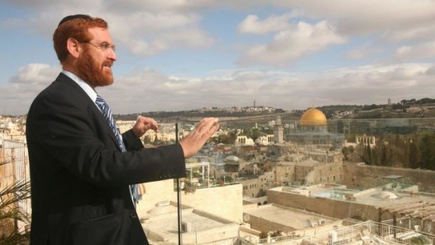 A 2010 photo shows Rabbi Yehuda Glick in Jerusalem on a rooftop overlooking the Old City. The golden Dome of the Rock, an Islamic shrine on the site known to Jews as the Temple Mount, can be seen on the right.