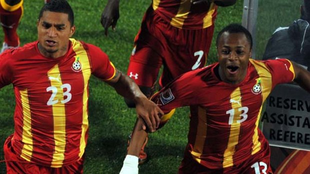 Fought for the continent ... Andre Ayew, right, celebrates with Kevin-Prince Boateng after Ghana went 1-0 up.