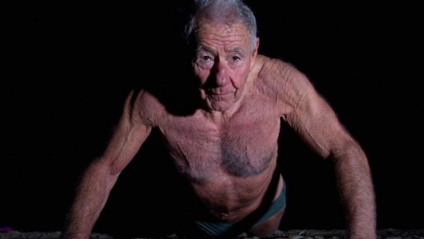 Tom Hafey exercises on the beach as part of his regular early morning training session on June 11, 2011.