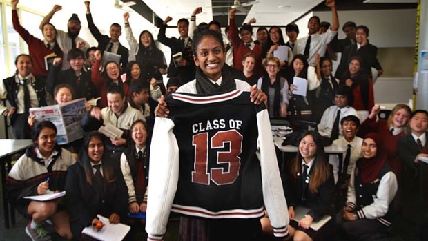 School captain Shirlene Perera stands before the first group of students to reach year 12 at Nossal High, a select-entry school in Berwick.