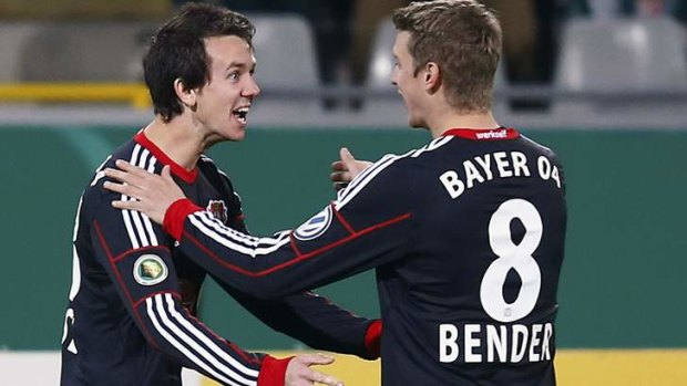 Kruse, left, with fellow Bayer Leverkusen player Sven Bender.