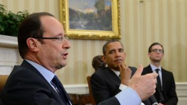 'Extraordinary importance' ... the US President, Barack Obama, listens to his French counterpart, Francois Hollande.