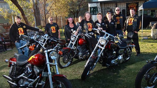 The Tramps' club members at a motorcycle gathering.
