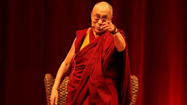 Humour and compassion: The Dalai Lama at the Sydney Entertainment Centre on Sunday.