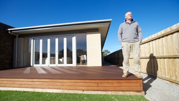 Point Lonsdale builder David Rowe at one of the houses the local council said could be subject to climate change flooding in 100 years.