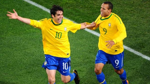 Easy winners ... Kaka, left, celebrates with Luis Fabiano after the striker scored Brazil's second.