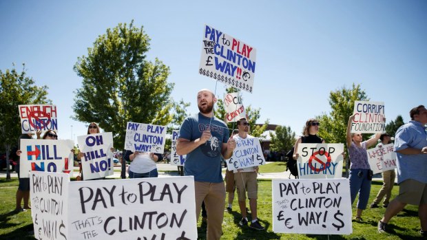 Protesters outside a community college before a campaign event with Hillary Clinton in Reno, Nevada on Thursday. 