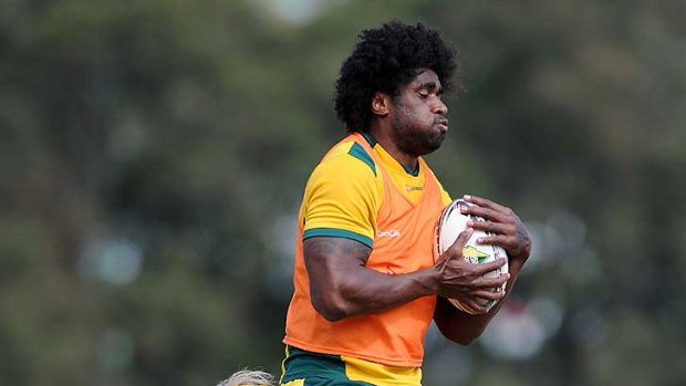 Radike Samo rehearses his lineout drill during a Wallabies training session at The Southport School in the Gold Coast last week.