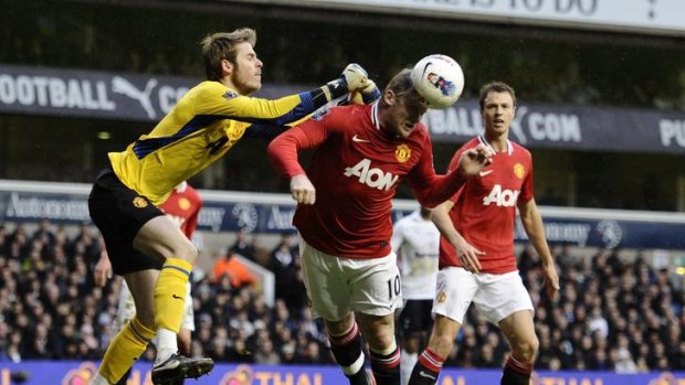 Manchester United's Wayne Rooney and teammate David de Gea.