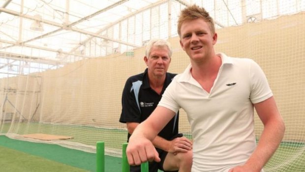 Sam Robson alongside his father Jim at the SCG nets.