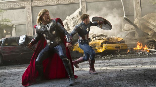 Chris Hemsworth as Thor, left, and Chris Evans portrays Captain America in a scene from <i>The Avengers</i>.