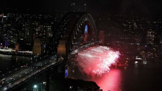 Circular Quay: Fireworks are let off under the Harbour Bridge in the 2013.