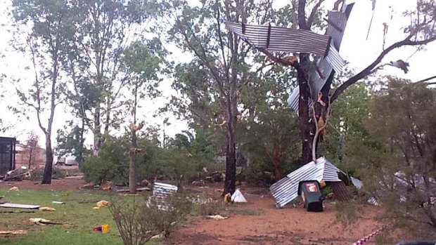 The storm tore corrugated iron from roofs at Jundah School and tossed it into trees.