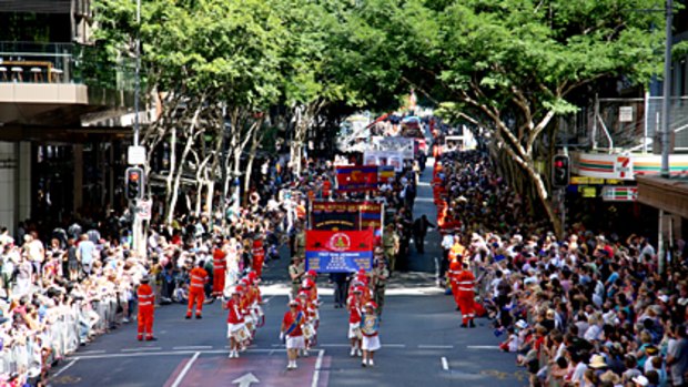 'At the end of the day it is veterans' day' ... thousands line Brisbane's CBD streets for the 2009 Anzac Day parade.