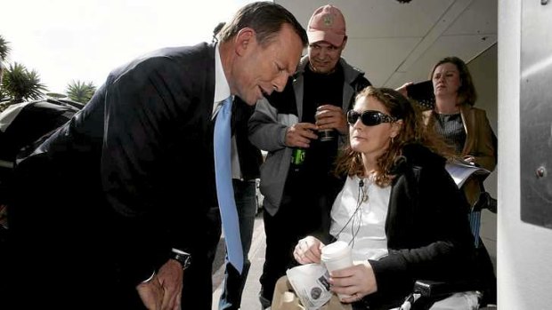 Medicine Man: Opposition Leader Tony Abbott chats to a St Vincent's Hospital patient on Thursday.