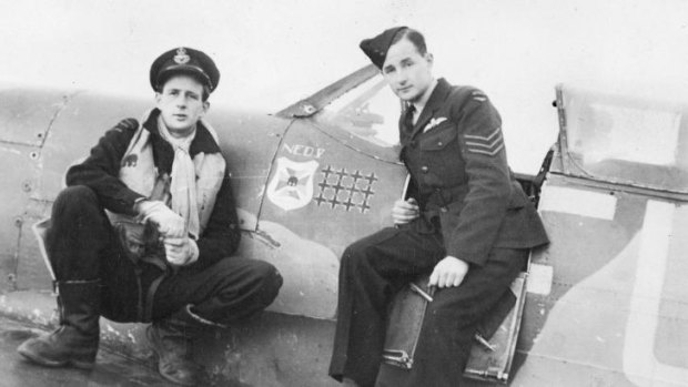 Flight Lieutenant John William (Jack) "Slim" Yarra and Sergeant Robert Ernest (Bob) Yarra standing by the cockpit of Yarra's Spitfire.