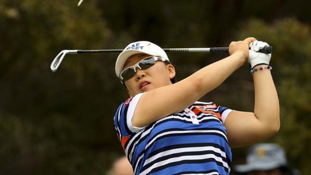 South Korea's Jiyai Shin at Commonwealth yesterday. She shares the lead in the Australian Open at six-under par.