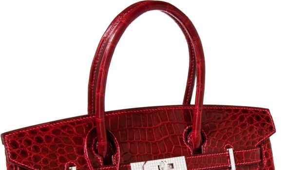 This crocodile hide Birkin featuring 18-karat white gold, diamond-encrusted hardware sold for $US203,525 at auction in 2011.
