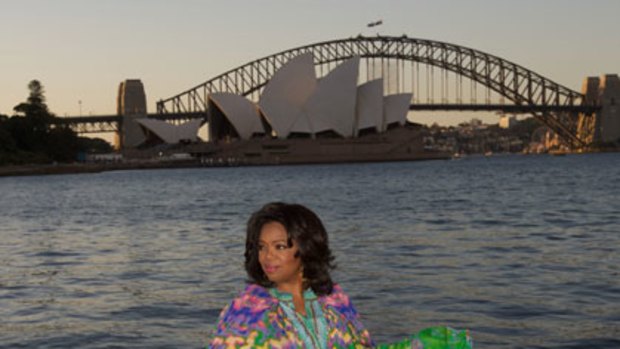Hello, Sydney ... Oprah Winfrey, wearing a kaftan by Sydney designer Camilla Franks, was guest of honour at a party – with 450 of her closest friends –  at Mrs Macquaries Chair last night.