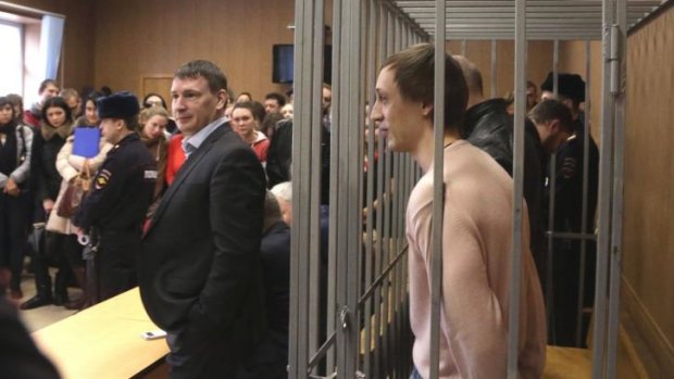 Guilty: Dmitrichenko faces his accusers in court.