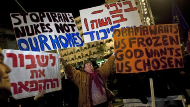 Why are we waiting? ... right-wing Israeli activists protested outside the Prime Minister’s residence against the decision to freeze construction in West Bank Jewish settlements.