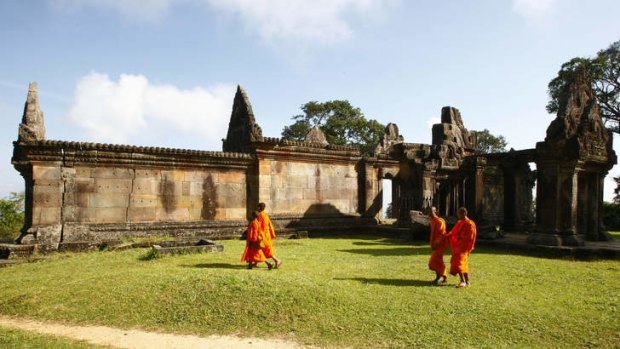 Sovereignty clarified: Cambodian Buddhist monks walk through the compound of the 900-year-old Preah Vihear Temple near the Cambodian-Thai border