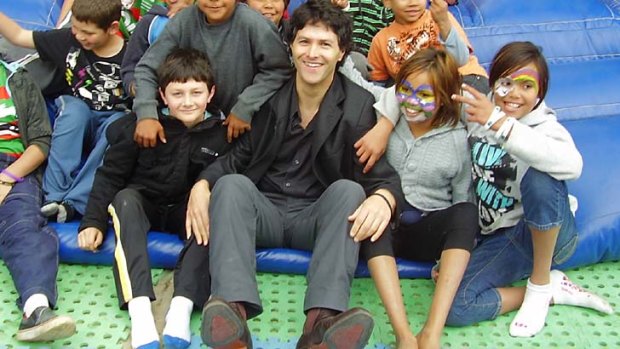 NSW Aboriginal Affairs Minister Victor Dominello with Wilcannia schoolchildren.