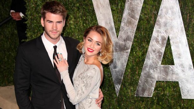 Liam Hemsworth with ex-fiance Miley Cyrus at the Vanity Fair Oscars party last year.
