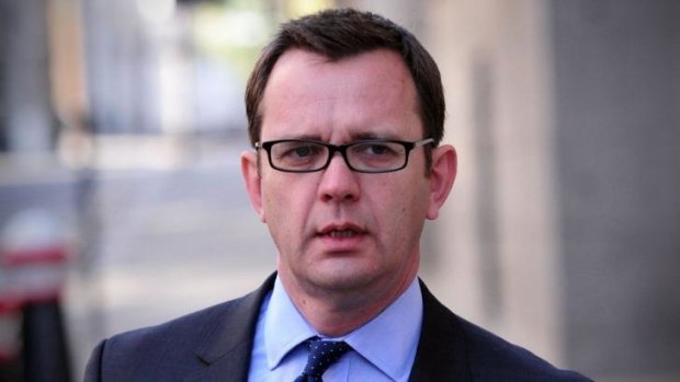 Former <i>News of the World</i> editor Andy Coulson arrives at court in London.